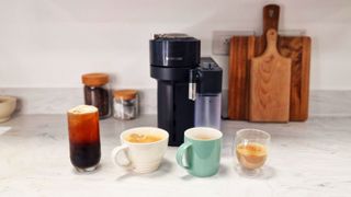 Nespresso Vertuo Lattissima next to four coffee drinks