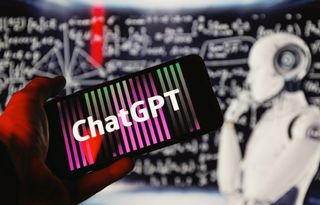 ChatGPT logo on phone in front of robot thinking